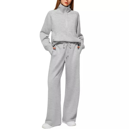 Women ounge sets feature drawstring sweatshirts and wide leg pants